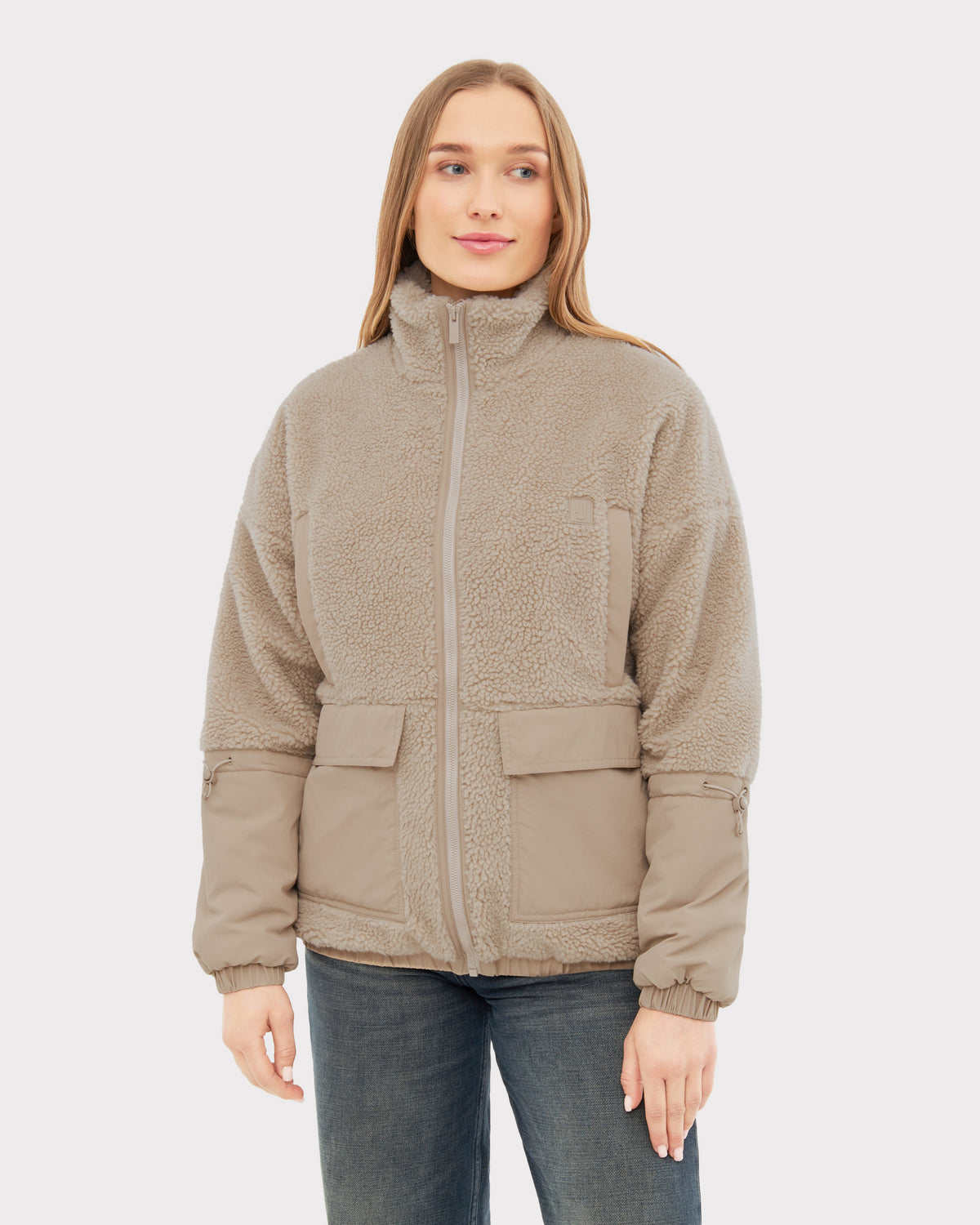 Beige Teddy Fleecejacke 'Carson' für Damen mit hohem Kragen, Reißverschluss und Taschen an Ärmeln und Bund