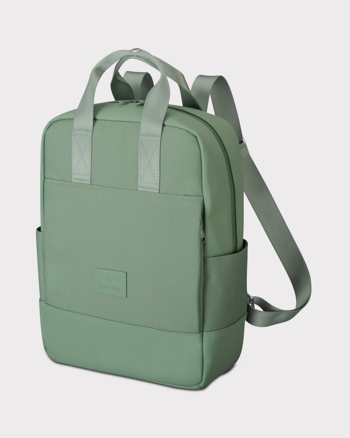 Moderner grünfarbener Rucksack 'Jona Medium' mit zwei Tragegriffen, Fronttasche und verstellbaren Schulterriemen